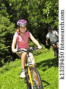 Family riding bicycles Family riding bicycles