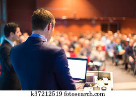 Speaker at Business Conference and Presentation. Speaker at Business Conference and Presentation.