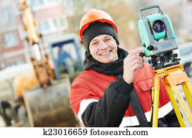surveyor works with theodolite