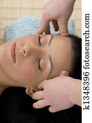 top view of woman taking head massage 