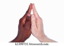Two hands of different races together form the shape of a church with a steeple (as in the childs hand game)symbolic for unity and harmony within the church