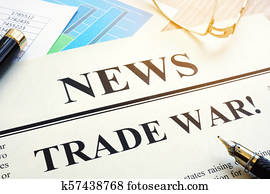 Newspaper with title Trade war on a desk. Newspaper with title Trade war on a desk.