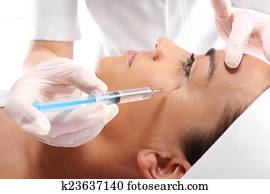 Cosmetic ampoule, a woman in the be Cosmetic ampoule, a woman in the be