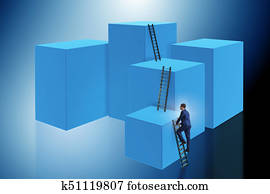 Businessman climbing blocks in challenge business concept