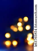 Background of blurry blue-blue lights of the Christmas-tree garland on the dark. Copy space Background of blurry blue-blue lights of the Christmas-tree garland on the dark. Copy space