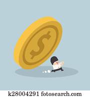Businessman running away from falling dollar coin