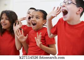 Group Of Children Enjoying Drama Class Together