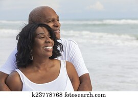 Happy Senior African American Couple on Beach