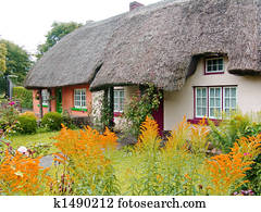 Typical thatched roof cottage in Ireland Typical thatched roof cottage in Ireland