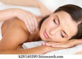 beautiful woman in spa salon getting massage beautiful woman in spa salon getting massage