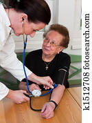 Doctor patient attaches the blood pressure Doctor patient attaches the blood pressure