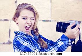 Girl holding camera