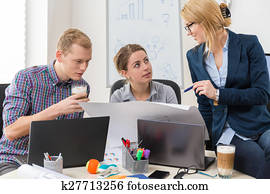 Office workers talking