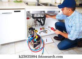 Plumber on the kitchen. Plumber on the kitchen.
