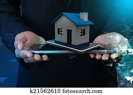 Showing home with smart phone Showing home with smart phone