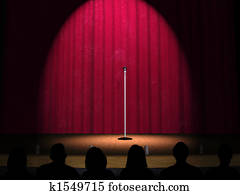 A microphone on a stage A microphone on a stage