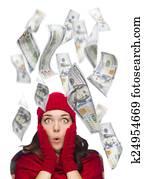 Young Excited Woman with $100 Bills Falling Around Her