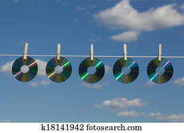 Five CDs On A Clotheslines