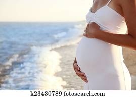pregnant woman on the beach pregnant woman on the beach
