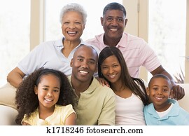 Extended family sitting on sofa Extended family sitting on sofa