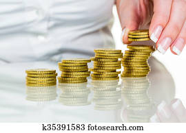 save woman with stack of coins in money save woman with stack of coins in money
