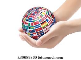 Flags of the world on a globe, held in hands. 