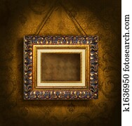 Gold picture frame on antique wallpaper Gold picture frame on antique wallpaper