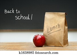 Paper lunch bag on desk Paper lunch bag on desk