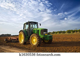 tractor in a field tractor in a field