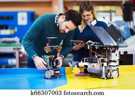 Young students of robotics working on project Young students of robotics working on project