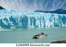 Boat sailing near Perito Moreno glacier, in Patagonia. Boat sailing near Perito Moreno glacier, in Patagonia.