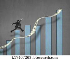 Businessman jumping on growing money trend with chart on wall 