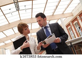 man and woman business talk