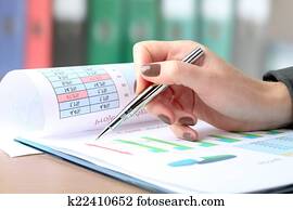 young businesswoman working in the office, sitting at her desk,