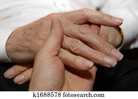 Caregiver holding Senior's hands