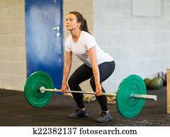 Woman Lifting Barbell