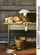 Old wash tub with soap and scrub brushes