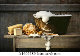 Old wash tub with soap on bench