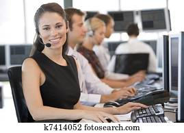 Stock Traders Working At Computers