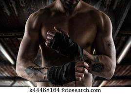 Boxer puts the tapes to his hands