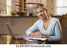 Woman on computer.