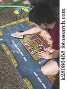 Child clean a carpet