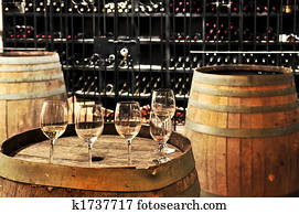 Wine glasses and barrels Wine glasses and barrels