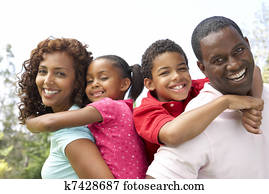 Portrait of Happy Family In Park