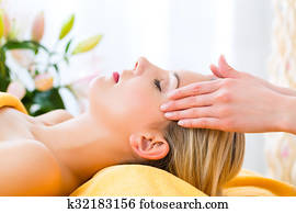 Wellness - woman getting head massage in Spa
