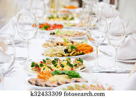 Catering food table set decoration Stock Photo | k5592257 | Fotosearch