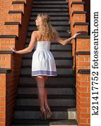 Coquettish young beautiful woman Coquettish young beautiful woman