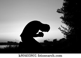 silhouette man praying silhouette man praying