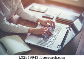 Female working with laptop at home woman's hands on notebook computer Writer blogger designer telework