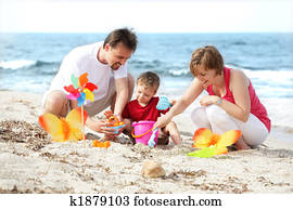 young happy family on the beach young happy family on the beach